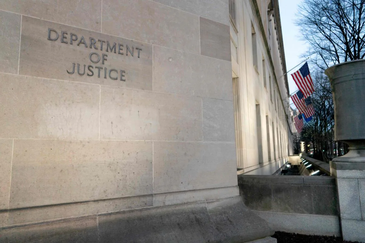 The Department of Justice building in Washington on Feb. 9, 2022. (STEFANI REYNOLDS/AFP via Getty Images)