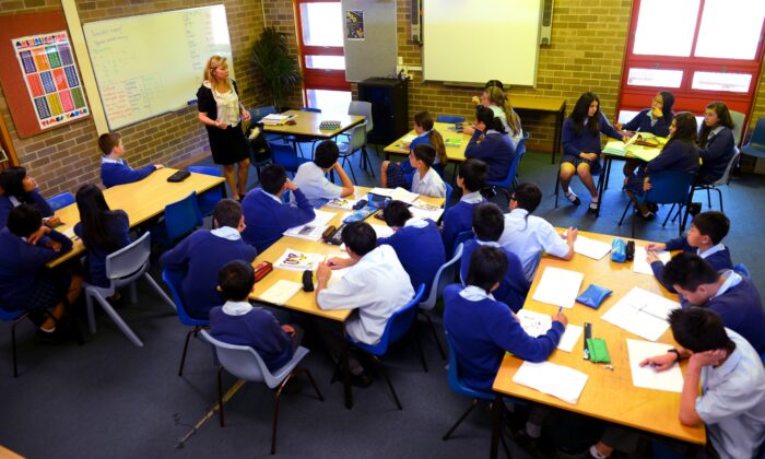 A teacher teaches Aboriginal languages to students at St Johns High School in Sydney, Australia, on Oct. 14, 2012. (William West/AFP via Getty Images)