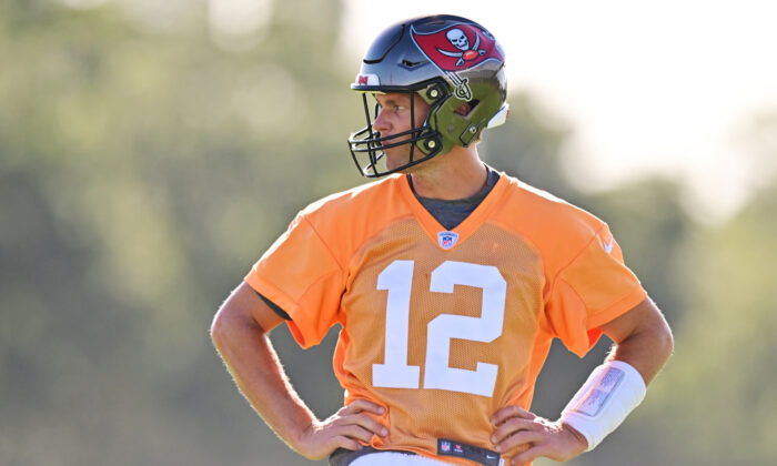 Tom Brady (12) of the Tampa Bay Buccaneers looks on during Buccaneers Training Camp at AdventHealth Training Center in Tampa, Fla., on July 27, 2022. (Julio Aguilar/Getty Images)