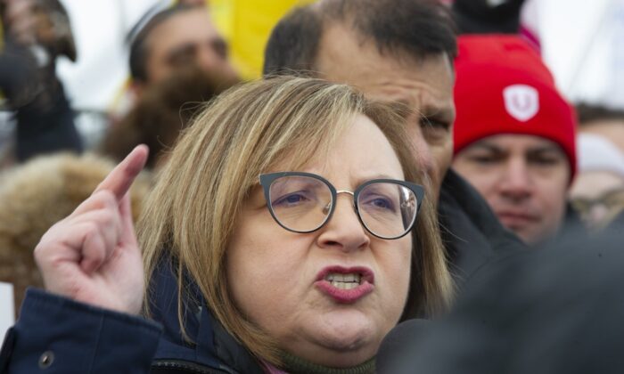 Lana Payne, secretary and treasurer for Unifor, speaks during a rally on the picket line outside the Co-op Refinery in Regina on Jan. 22, 2020. (The Canadian Press/Mark Taylor)