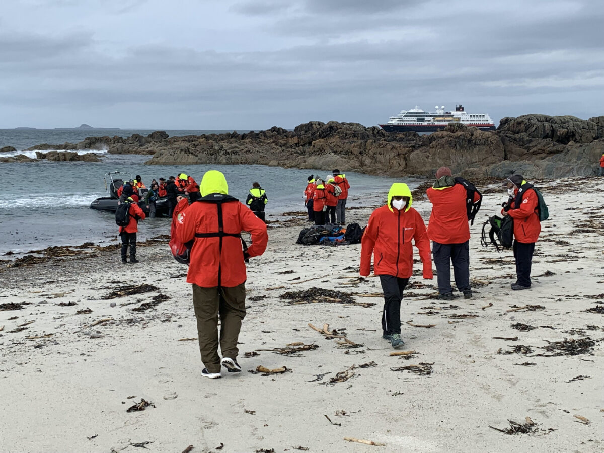 After a blustery day on the Scottish island of Iona, Hurtigruten passengers approach the Zodiac RIB that will take them back to their ship. (Photo courtesy of Sharon Whitley Larsen.) 