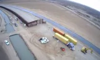 Biden Administration Tells Arizona Using Shipping Containers to Plug Gaps in Border Wall Is Illegal