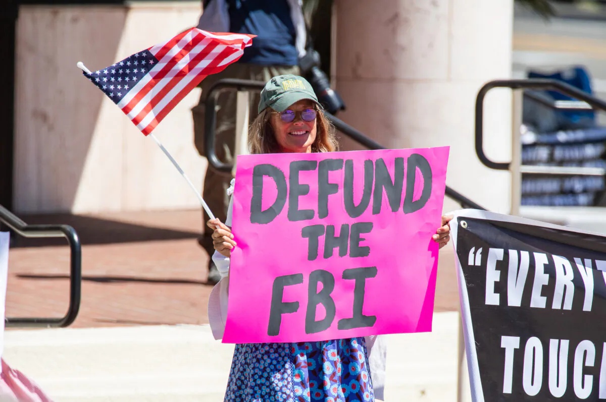 People gather in protest of the FBI in Santa Ana, Calif., on Aug. 12, 2022. (John Fredricks/The Epoch Times)
