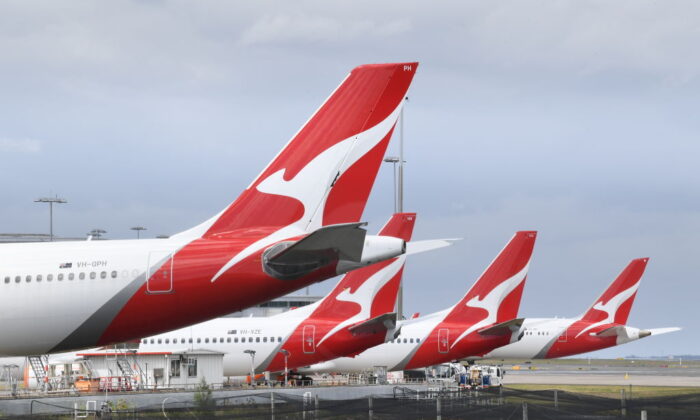 A line of Qantas aircraft sits at Kingsford Smith Airport in Sydney, Australia, on Oct. 31, 2021. (James D. Morgan/Getty Images)