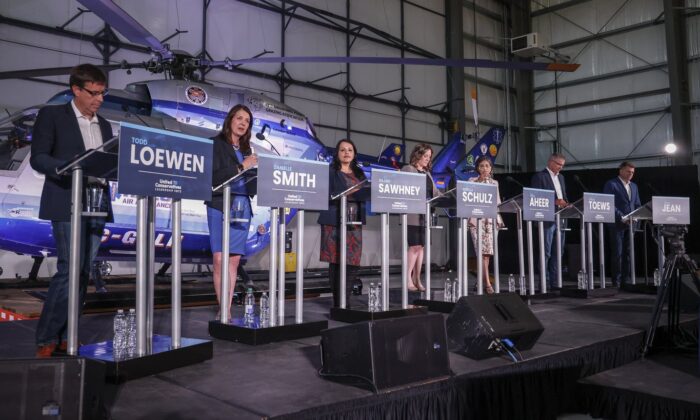Candidates (left to right) Todd Lowen, Daniel Smith, Rajan Thorney and Rebecca Sawney attend the Alberta Union Conservative Party leadership candidate debate in Medicine Hat, Alberta on July 27, 2022. Schultz, Leela Ahir, Travis Toos, Brian Jean.  (Canadian Press/Jeff McIntosh)