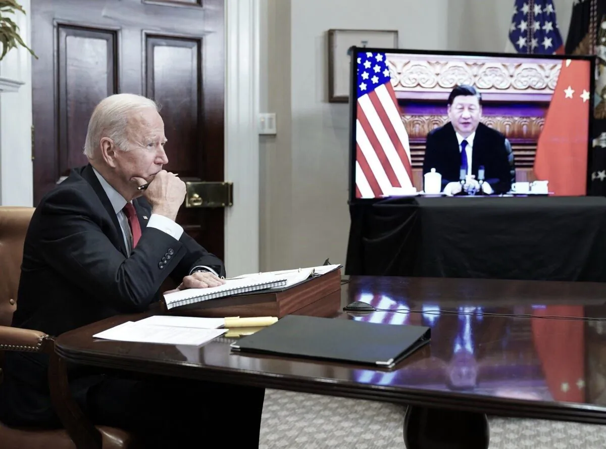 U.S. President Joe Biden meets with Chinese leader Xi Jinping during a virtual summit from the Roosevelt Room of the White House in Washington on Nov. 15, 2021. (Mandel Ngan/AFP via Getty Images)