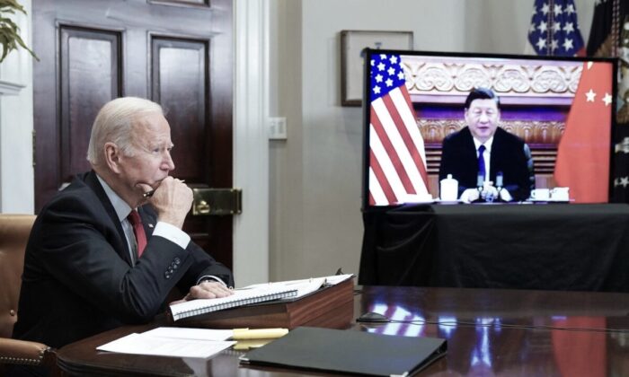 U.S. President Joe Biden meets with Chinese leader Xi Jinping during a virtual summit from the Roosevelt Room of the White House in Washington on Nov. 15, 2021. (Mandel Ngan/AFP via Getty Images)