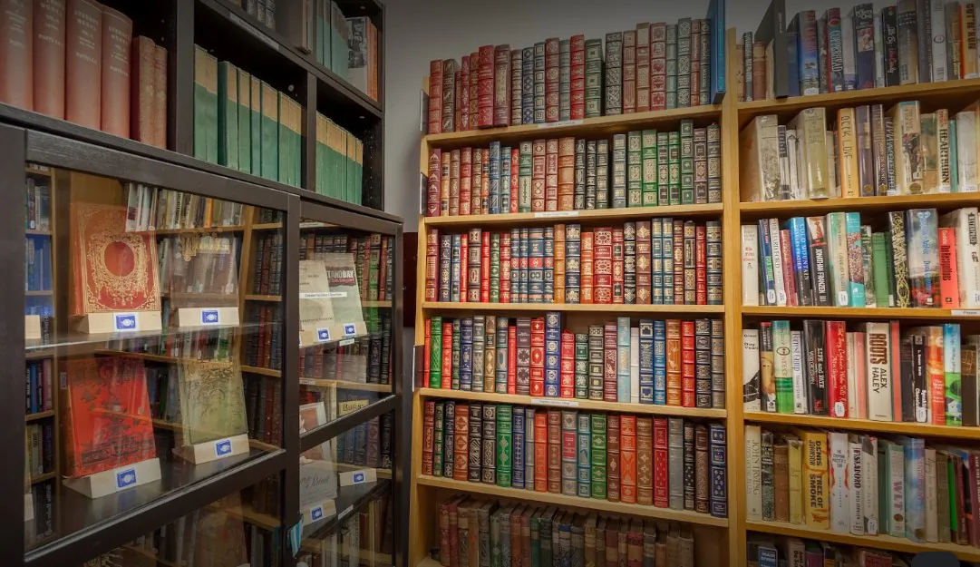A wall of used books inside Blue Plate Books in Winchester, Virginia, a tidy, clean, well-lit shop, with some soft piano music in the background. The bookstore has 20 or more hideaways and cubicles, created by shelves of books, most of them floor to ceiling, with the books themselves categorized by genre, alphabetized by author. (Courtesy of Blue Plate Books)