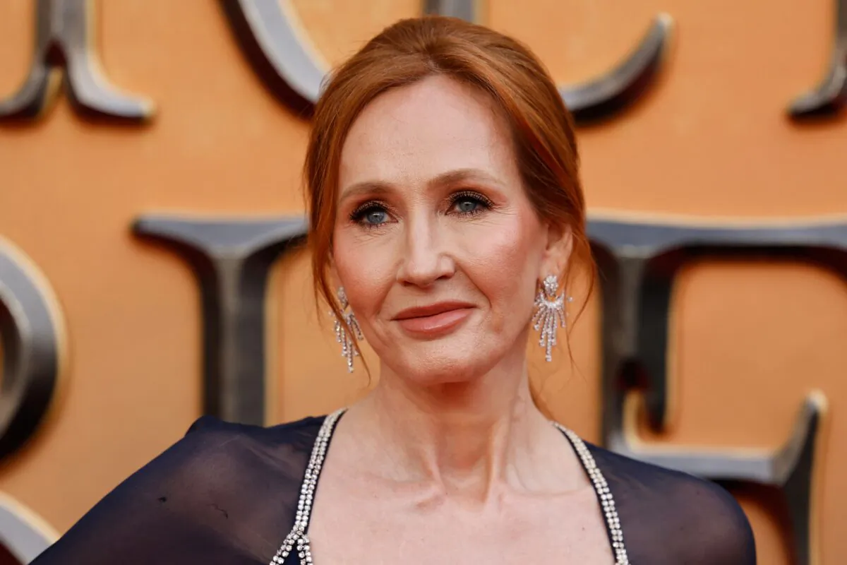 British writer JK Rowling poses on the red carpet after arriving to attend the World Premiere of the film "Fantastic Beasts: The Secrets of Dumbledore" in London on March 29, 2022. (Tolga Akmen/AFP via Getty Images)