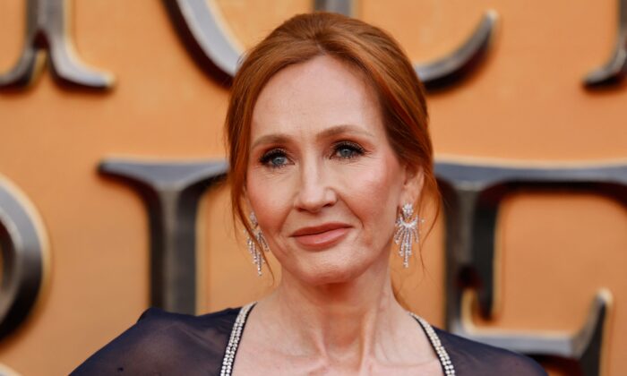 British writer J.K Rowling poses on the red carpet after arriving to attend the World Premiere of the film "Fantastic Beasts: The Secrets of Dumbledore" in London on March 29, 2022. (Tolga Akmen/AFP via Getty Images)