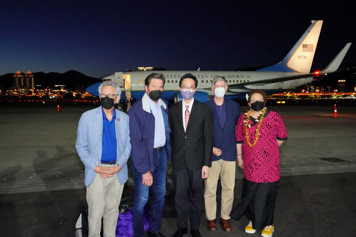 (L–R) U.S. Reps. Alan Lowenthal (D-Calif.), John Garamendi (D-Calif.), Taiwan’s Foreign Ministry Department of North American Affairs Director-General Douglas Hsu, U.S. Rep. Don Beyer (D-Va.), and Republican Rep. Aumua Amata Coleman Radewagen, a delegate from American Samoa, pose for a photo at Songshan Airport in Taipei, Taiwan, on Aug. 14, 2022. (Taiwan Ministry of Foreign Affairs/Handout via Reuters)