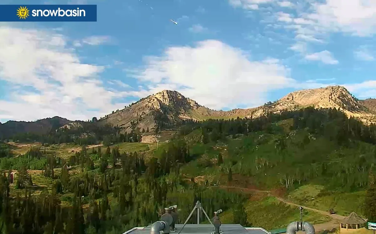 This image from video shows a web cam capture of a meteor flying over Snowbasin in Huntsville, Utah, on Aug. 13, 2022. (Snowbasin Resort via AP)