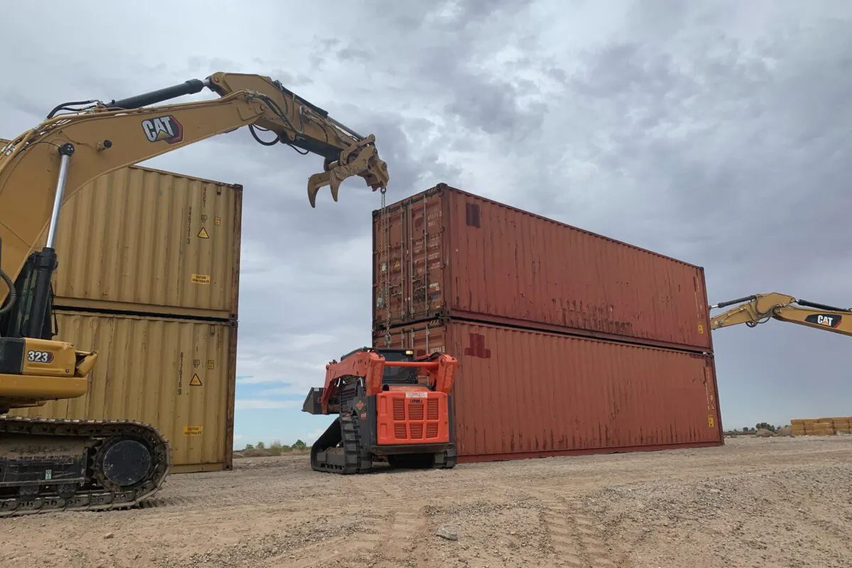 Shipping containers will be used to fill a 1,000 foot gap in the border wall with Mexico near Yuma, Ariz., on Aug. 12, 2022. Republican Gov. Doug Ducey acted without federal permission and plans to fill three gaps totaling 3,000 feet in the coming weeks. (Arizona Governor's Office via AP)