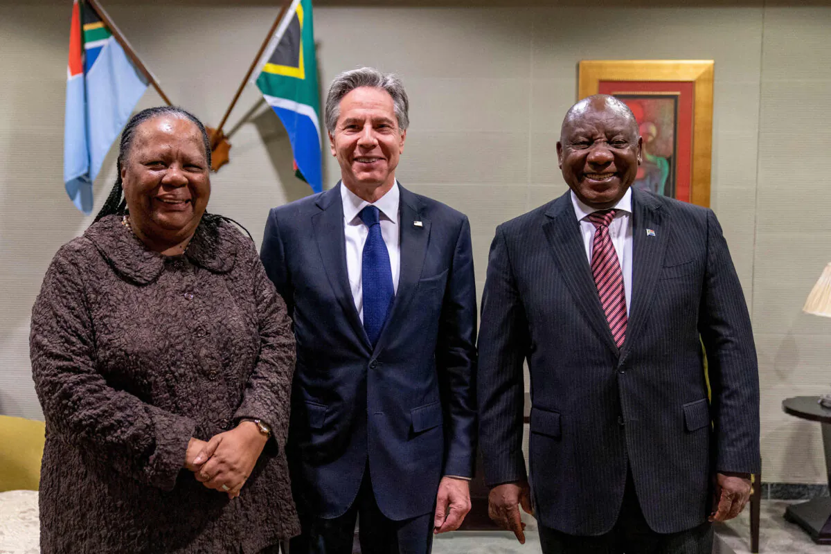 South African Foreign Minister Naledi Pandor (L), U.S. Secretary of State Antony Blinken (C), and South African President Cyril Ramaphosa pose for photographers as they meet at Waterkloof Airforce Base in Centurion, Gauteng, South Africa, on Aug. 9, 2022. (Andrew Harnik/AFP via Getty Images)