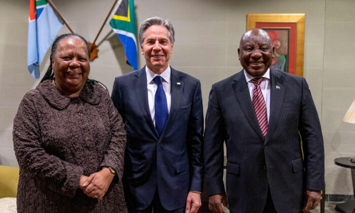 South African Foreign Minister Naledi Pandor (L), U.S. Secretary of State Antony Blinken (C), and South African President Cyril Ramaphosa pose for photographers as they meet at Waterkloof Airforce Base in Centurion, Gauteng, South Africa, on Aug. 9, 2022. (Andrew Harnik/AFP via Getty Images)