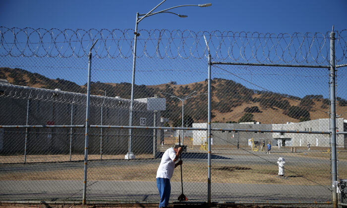 A California State Prison inmate works on the garden in the prison yard, in Vacaville, California, on October 19, 2015. (Justin Sullivan/Getty Images)