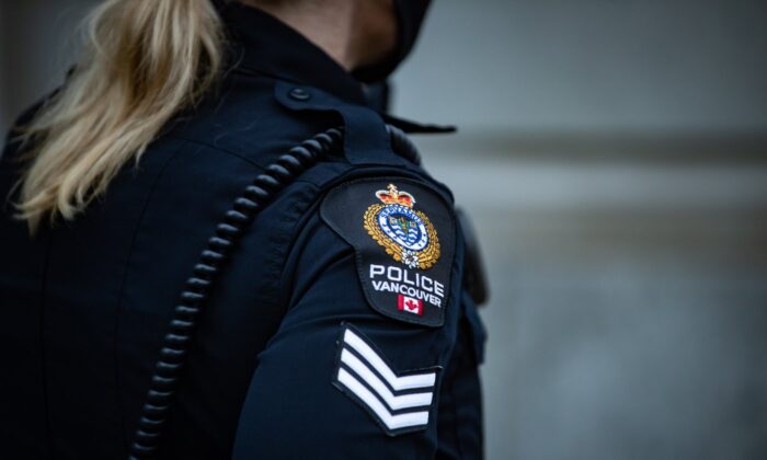 A Vancouver Police Department patch on a police officer's uniform after responding to an unknown incident in Vancouver's downtown East Side on January 9, 2021.  (The Canadian Press/Darryl Dyck)