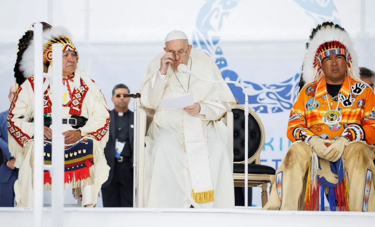Surrounded by Grand Chiefs, Pope Francis reads his statement of apology at the site of the former Ermineskin Residential School in Maskwacis, Alberta, on July 25, 2022. (Cole Burston/Getty Images)