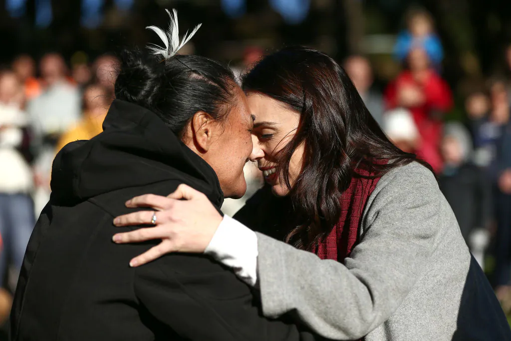 New Zealand Prime Minister Jacinda Ardern is greeted with a hongi during a 'Trees That Count' Matariki tree planting event at Mount Victoria mountain bike skills area in Wellington, New Zealand, on June 30, 2019. (Hagen Hopkins/Getty Images)