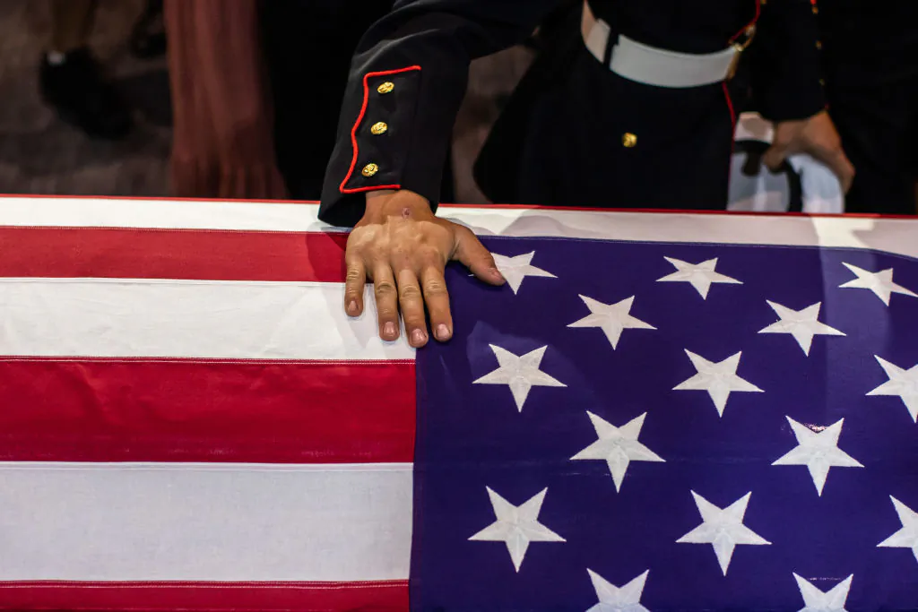 People pay their respects during the funeral of Marine Lance Cpt. Kareem Grant Nikoui at the Harvest Christian Fellowship in Riverside, Calif., on Sept. 18, 2021.(Apu Gomes/AFP via Getty Images)