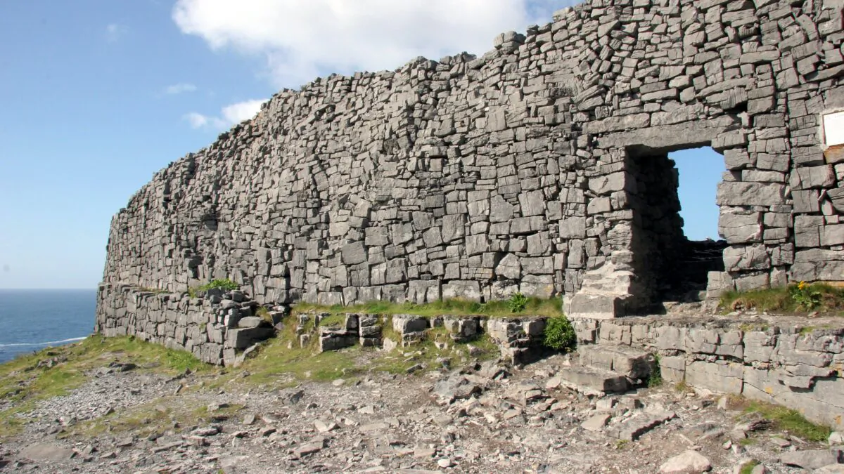 At the prehistoric fortress of Dun Aengus, the dramatic west cliffs of Ireland meet the turbulent sea as Europe comes to an abrupt end. (Pat O'Connor, Rick Steves' Europe)