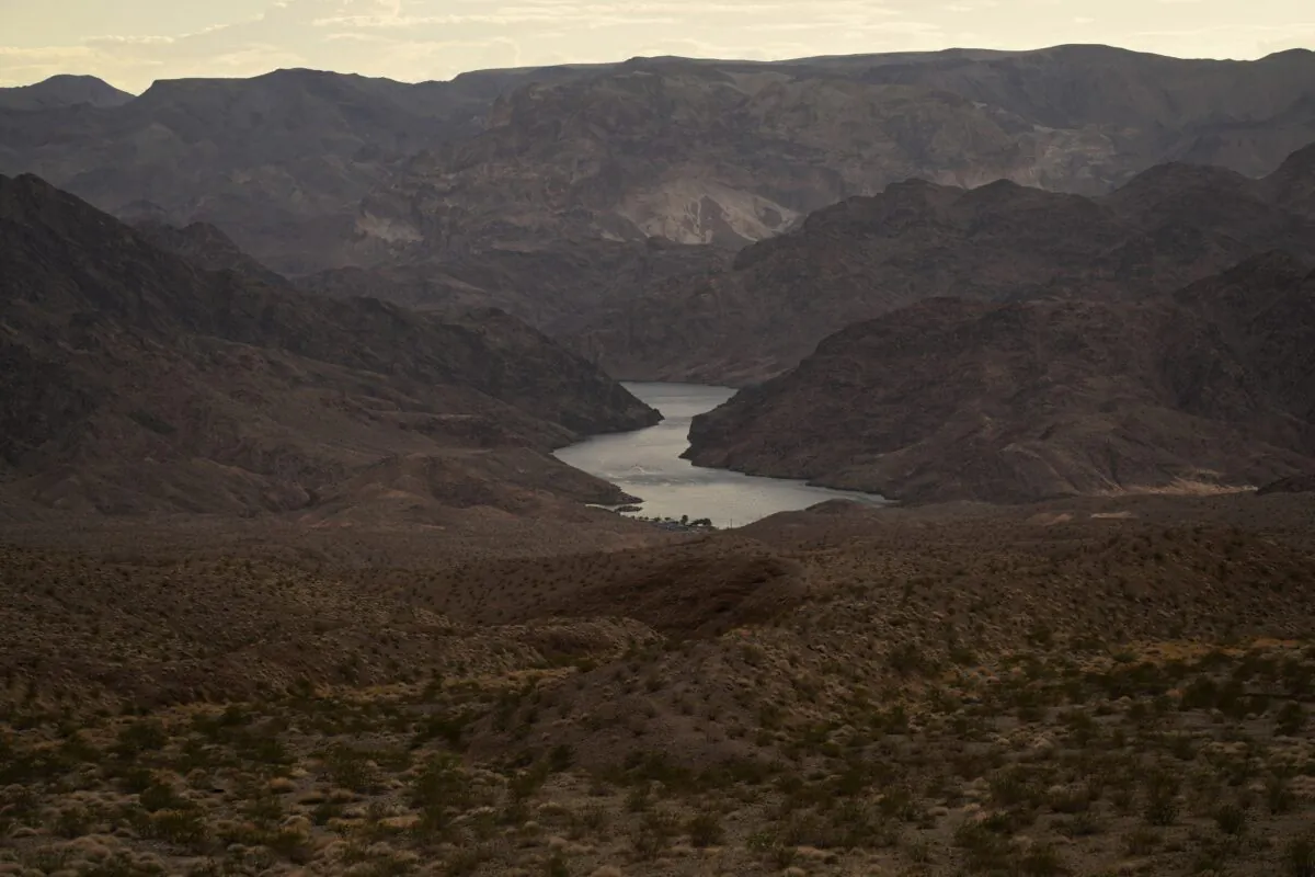 Water flows down the Colorado River downriver from Hoover Dam in northwest Ariz. on Aug. 14, 2022, near the Lake Mead National Recreation Area. (John Locher/AP Photo)