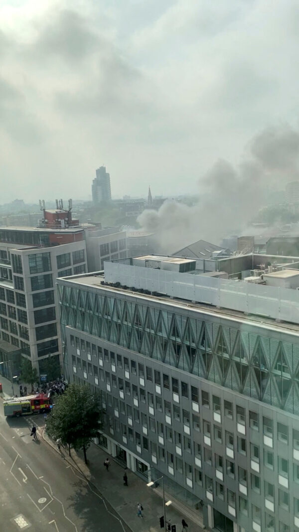 Smoke rises on Union Street after a fire broke out near London Bridge