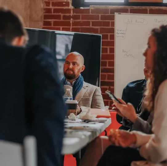 Red Balloon's CEO, Andrew Crapuchettes, at a staff meeting. (Courtesy Red Balloon)