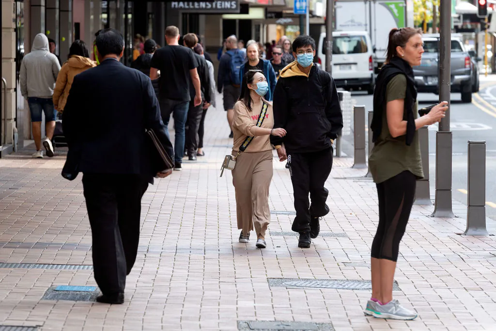 People walk on a street in Wellington, New Zealand, on May 14, 2020. (Marty Melville/AFP via Getty Images)