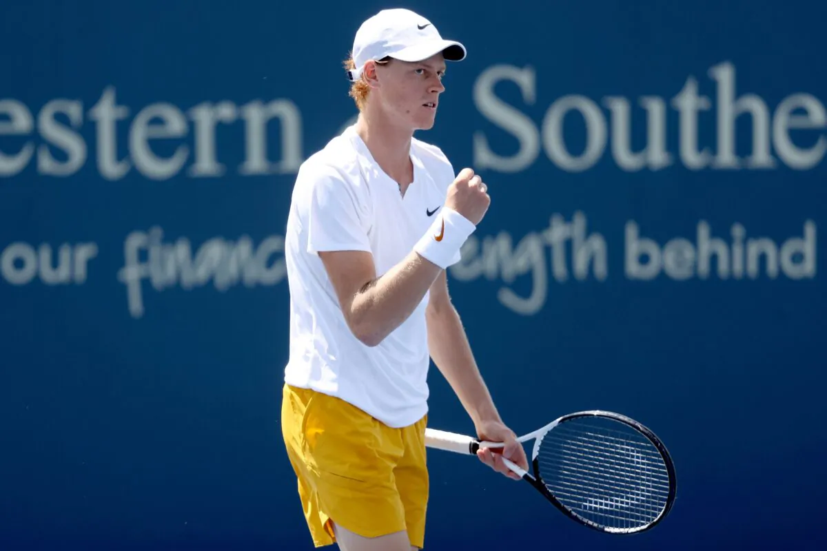 Jannik Sinner of Italy celebrates while playing Thanasi Kokkinakis of Australia during the Western & Southern Open at Lindner Family Tennis Center in Mason, Ohio, on Aug. 16, 2022. (Matthew Stockman/Getty Images)
