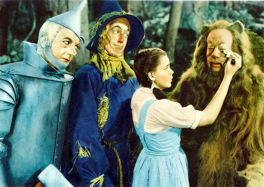 Lobby card from the original 1939 release of "The Wizard of Oz" featuring Judy Garland, Ray Bolger, Jack Haley and Bert Lahr. (Public Domain)