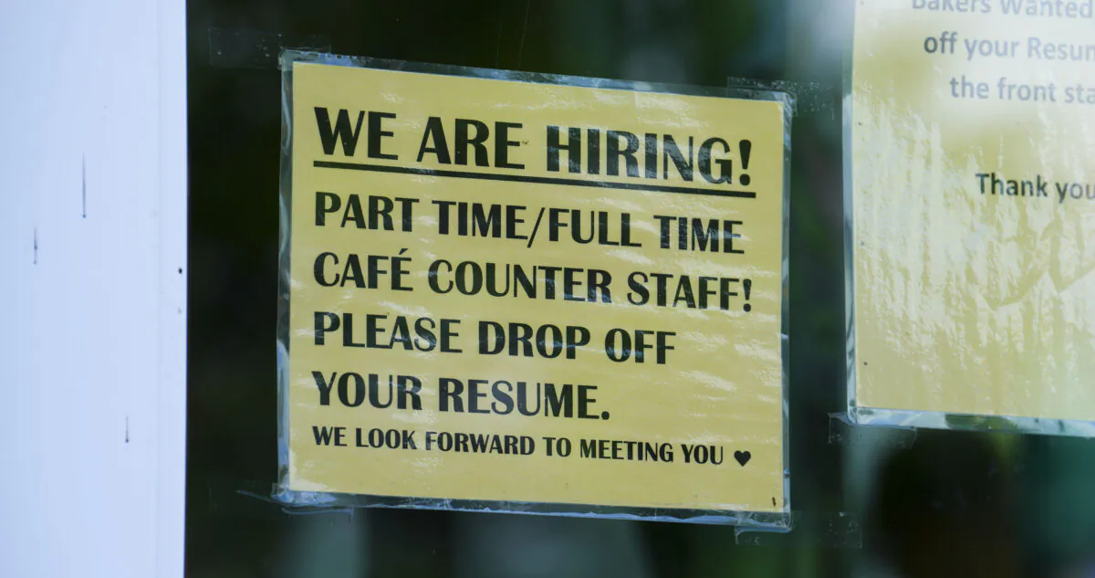 A help wanted sign is displayed in the window of a small business in Ottawa on July 12, 2022. (The Canadian Press/Sean Kilpatrick)