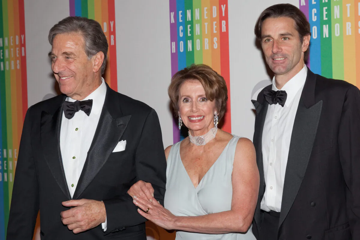 House Minority Leader Nancy Pelosi (C) arrives with her husband Paul Pelosi (L) and son Paul Pelosi, Jr. at the 35th Kennedy Center Honors, at the Kennedy Center in Washington, on Dec. 2, 2012. (Drew Angerer/AFP via Getty Images)