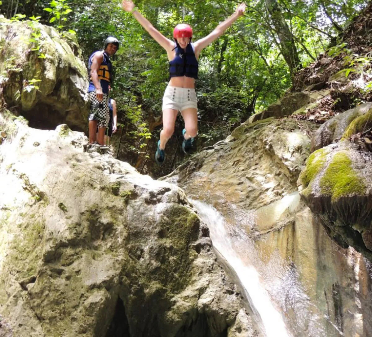 A visitor to Puerto Plata in the Dominican Republic prepares to tackle a natural waterslide. (Courtesy of Iguana Mama.)