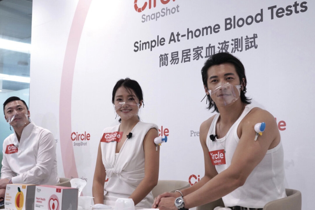 A testing company has launched home blood test products that allow citizens to collect blood samples by themselves to test for COVID-19 virus antibody levels, heart health, etc. The system was demonstrated in Hong Kong on Aug. 16, 2022. (Adrian Yu/The Epoch Times)