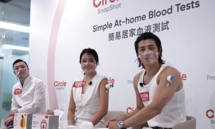 A testing company has launched home blood test products that allow citizens to collect blood samples by themselves to test for COVID-19 virus antibody levels, heart health, etc. The system was demonstrated in Hong Kong on Aug. 16, 2022. (Adrian Yu/The Epoch Times)