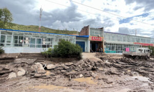 At Least 16 Dead, 18 Missing in Flash Flood in Western China
