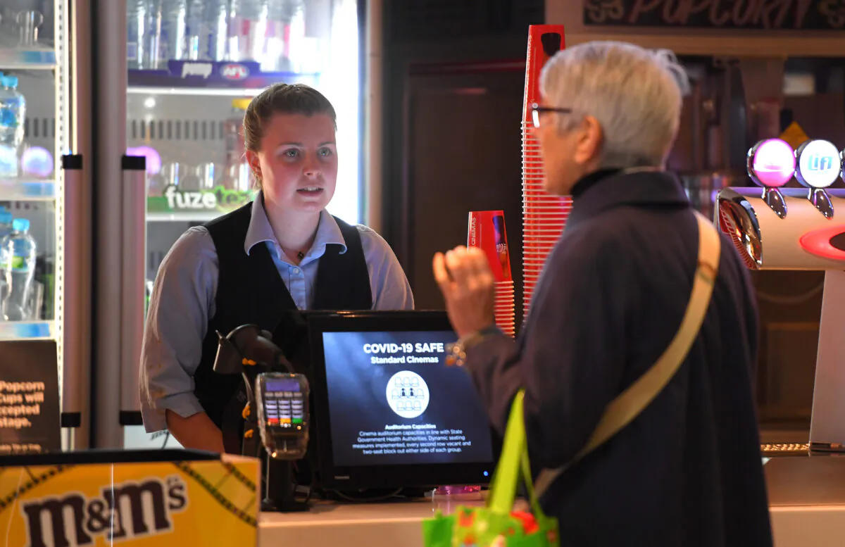 Staff at Village Cinema, Geelong serve customers in Geelong, Australia, on June 22, 2020. (Quinn Rooney/Getty Images)
