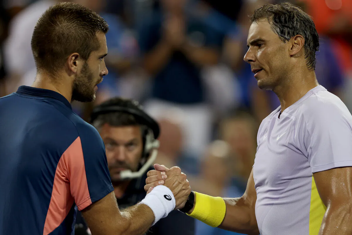Borna Coric of Croatia is congratulated by Rafael Nadal of Spain after their match during the Western & Southern Open at Lindner Family Tennis Center in Mason, Ohio, on August 17, 2022. (Matthew Stockman/Getty Images via Field Level Media)