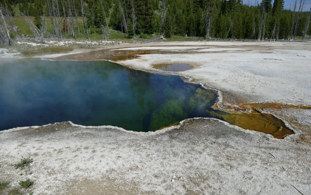 The Abyss Pool hot spring in the southern part of Yellowstone National Park, Wyo., in June 2015. (Diane Renkin/National Park Service via AP)