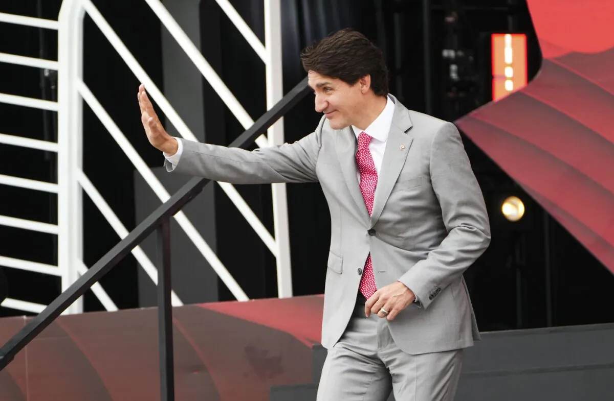 Prime Minister Justin Trudeau waves to the crowd after delivering a speech during Canada Day celebrations at LeBreton Flats in Ottawa on July 1, 2022. (The Canadian Press/Sean Kilpatrick)