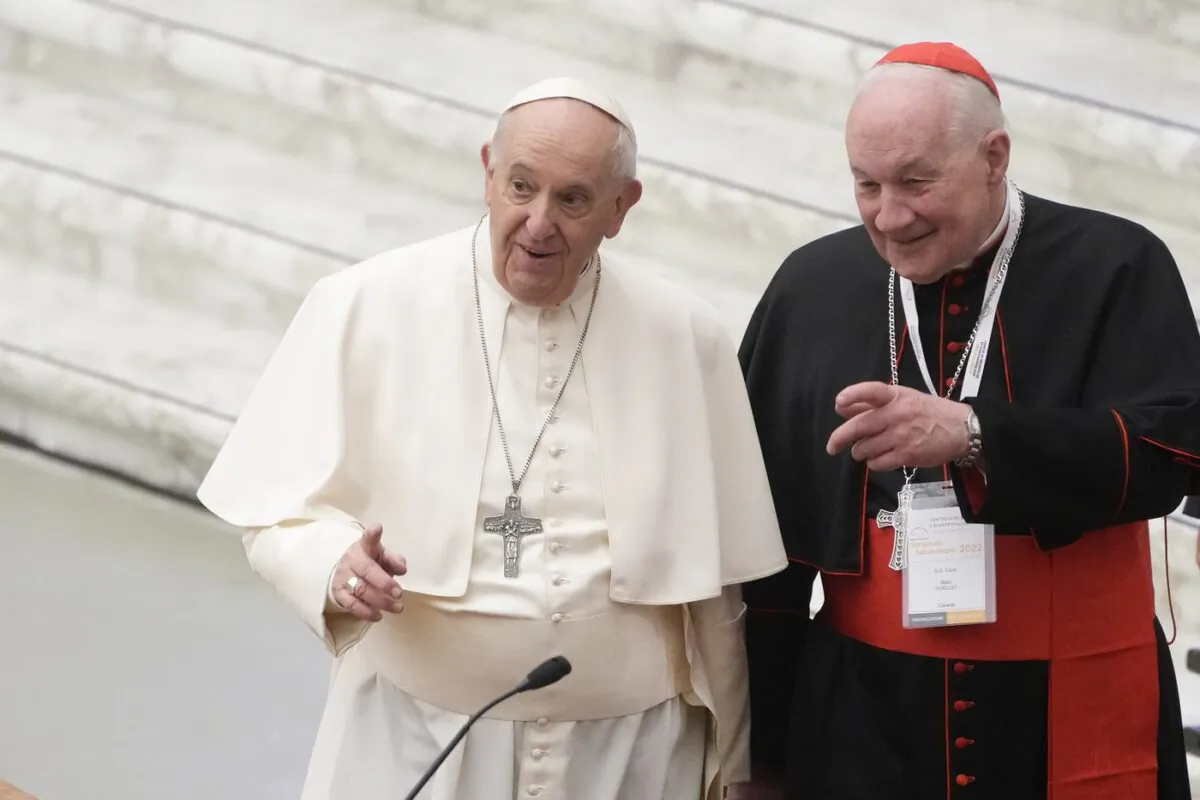 Pope Francis, left, and Cardinal Marc Ouellet arrive at the opening of a 3-day Symposium on Vocations in the Paul VI hall at the Vatican on Feb. 17, 2022. (The Canadian Press/AP/Gregorio Borgia)