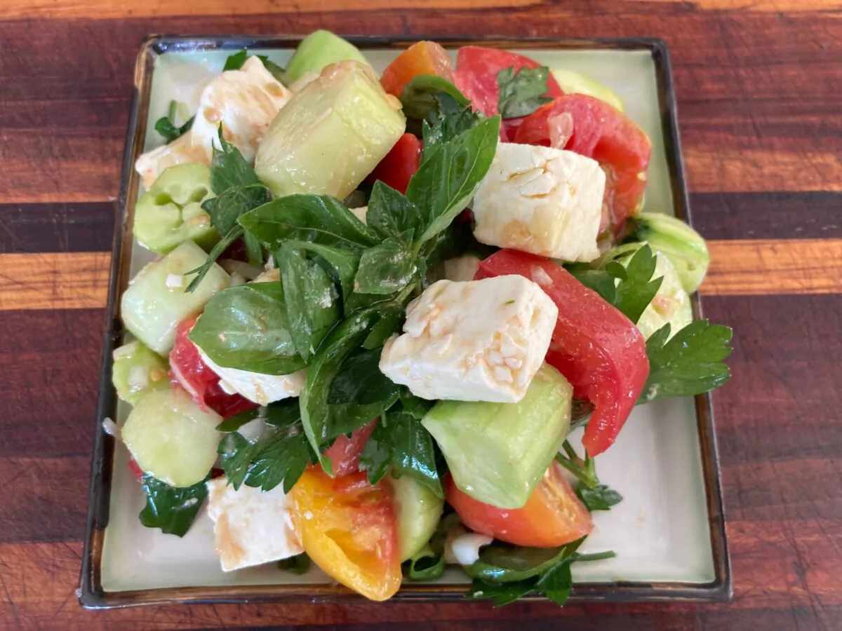 This salad brings together refreshing summer vegetables, creamy, salty feta, and a swirl of herbs, acids, and spicy alliums. (Ari LeVaux)