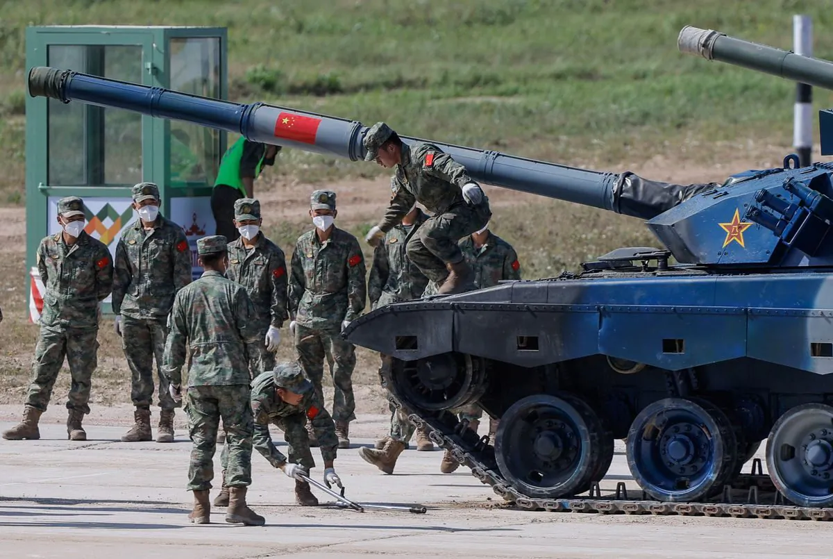 Chinese soldiers operate with their Type 96A tank during the Tank Biathlon competition at the International Army Games 2022 in Alabino, outside Moscow, Russia, on Aug. 16, 2022. Moscow announced its plans to hold joint military exercises with China, India, Mongolia, Belarus, and Tajikistan from Aug. 30 to Sept. 5, 2022. (Maxim Shemetov/Reuters)