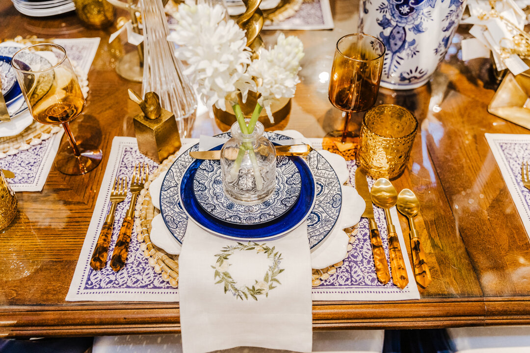 Brown takes an elegant spin with tortoiseshell flatware and brown glassware on this tabletop. (Handout/TNS)