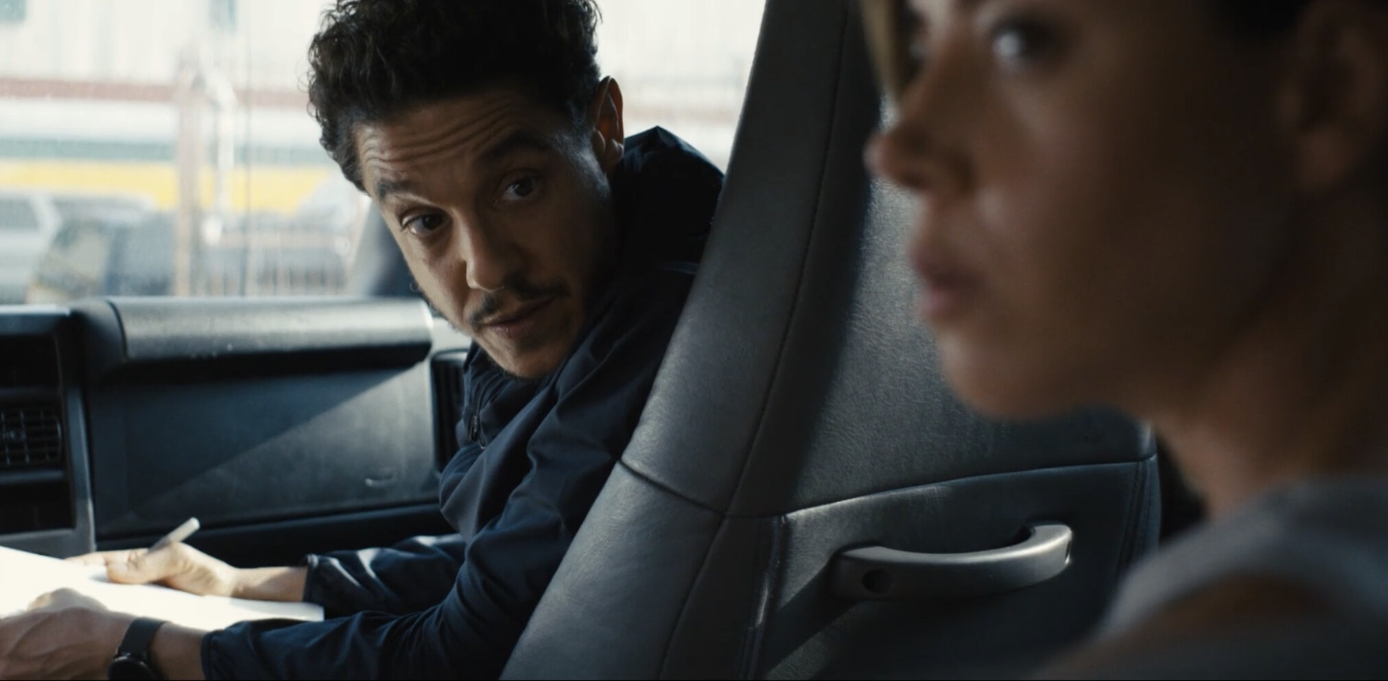 man and woman in car in EMILY THE CRIMINAL