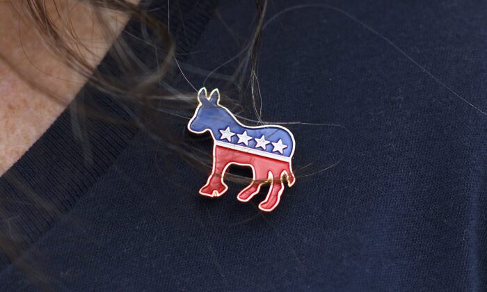 A person wears a Democrat donkey pin in Philadelphia, Pa., on Sept. 21, 2018. (Mark Makela/Getty Images)