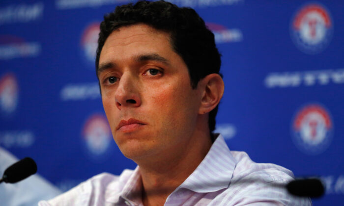 President of Baseball Operations and General Manager Jon Daniels of the Texas Rangers talks with the media at Globe Life Park in Arlington in Arlington, Texas, on Sept. 5, 2014. (Tom Pennington/Getty Images)