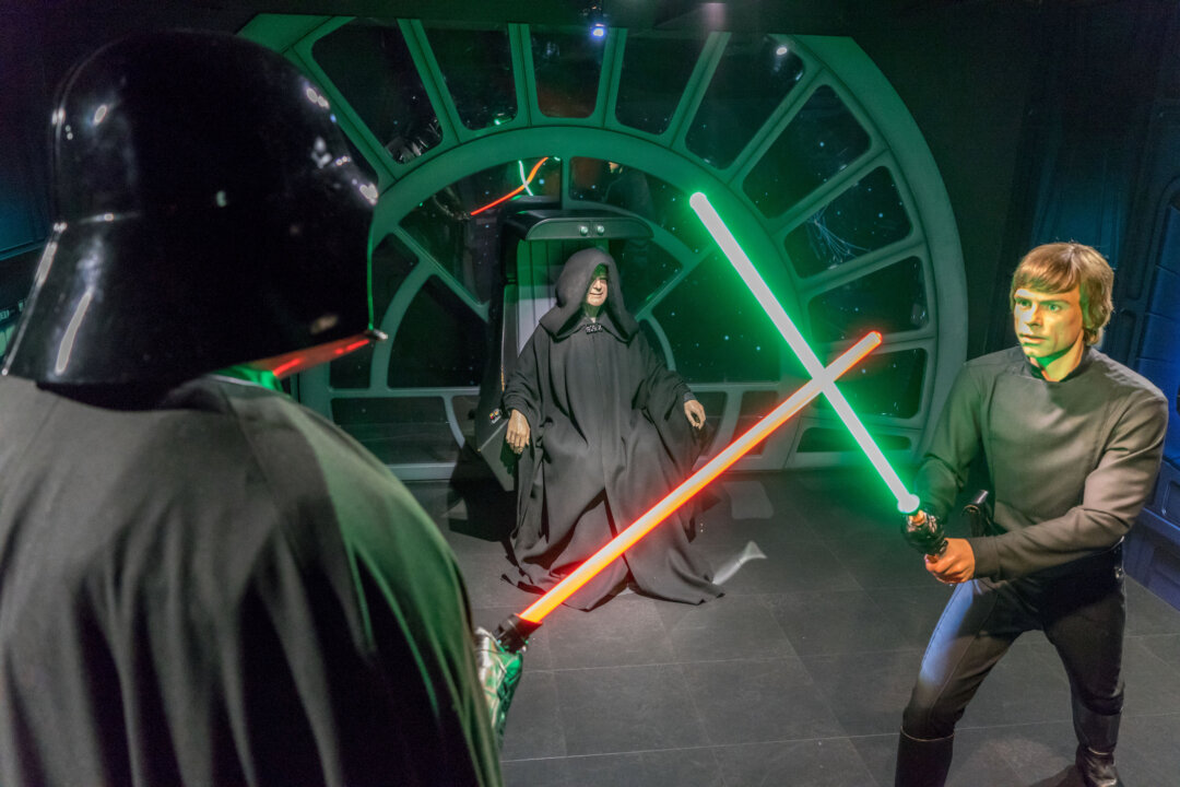 Madame Tussaud’s Waxwork Museum, London, December 2015, Star Wars display, Luke Skywalker fights Darth Vader with glowing lightsabers, while being watched by the Emperor (RichartPhotos/Shutterstock)