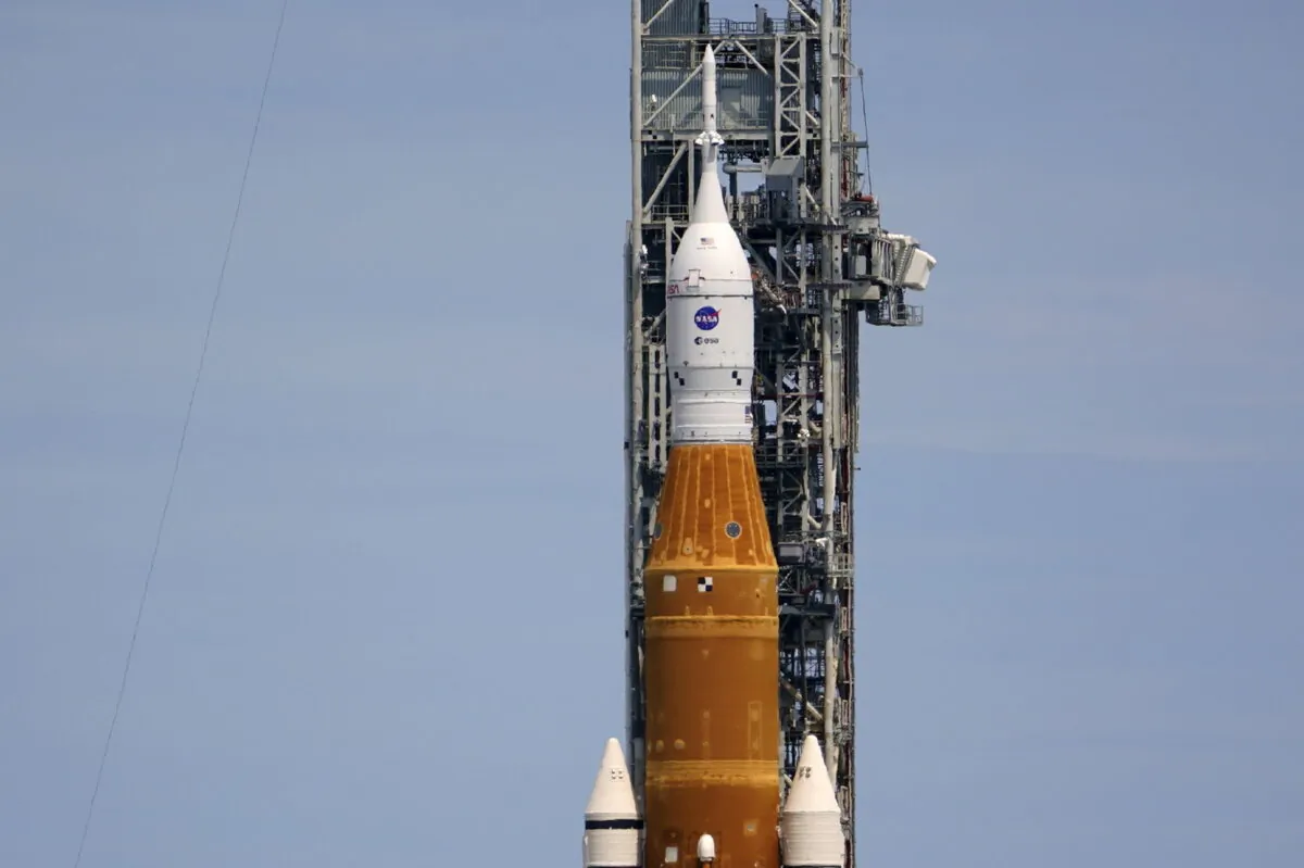 The NASA moon rocket stands on Pad 39B after the previous day's scrub for the Artemis 1 mission to orbit the Moon at the Kennedy Space Center in Cape Canaveral, Fla., on Aug. 30, 2022. (John Raoux/AP Photo)